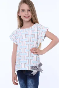 Girl's blouse with patterns and bow #1432554