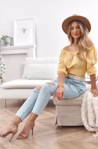 Yellow short blouse crumpled down