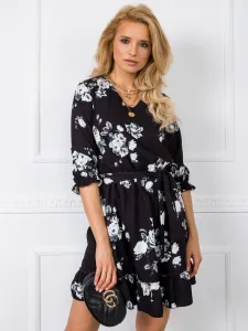 Black dress with artificial flowers